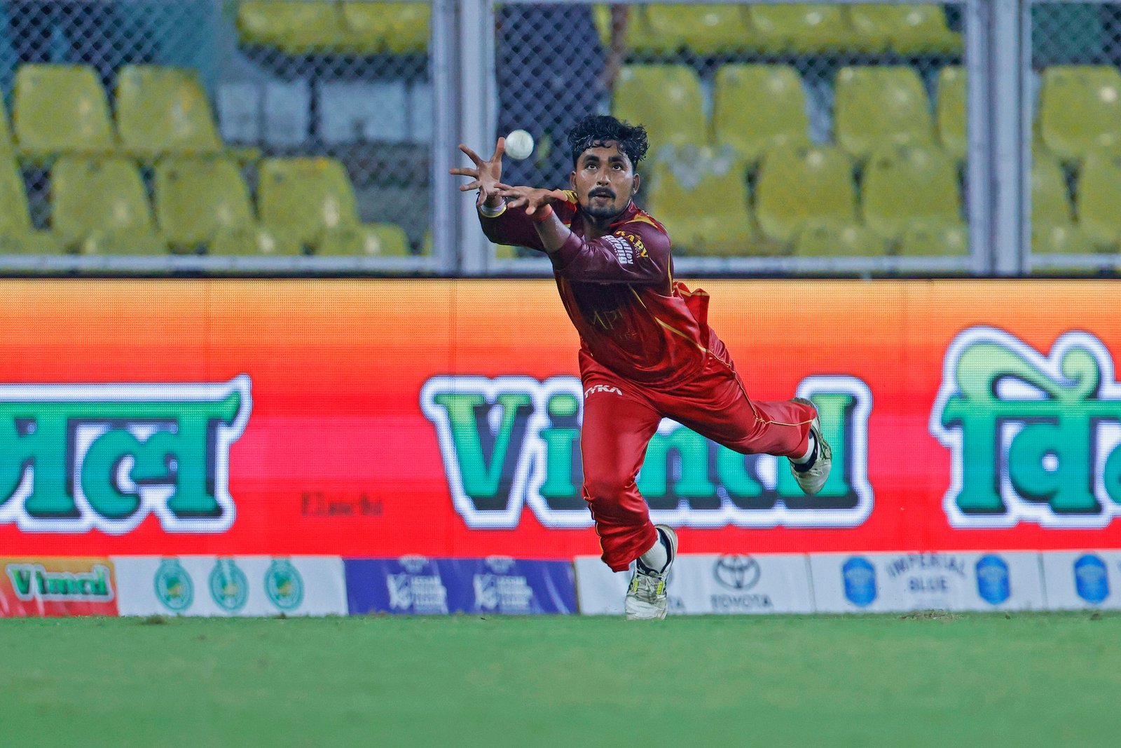 Mohit Thakur of team Barak Legends drops Danish Ahmed of team Tezpur Titans during Match 24 of the APL T20 between Tezpur Titans and Barak Legends at ACA Stadium, Barsapara, Guwahati, India, on August 12, 2026.

Photo by R.Param / CREIMAS