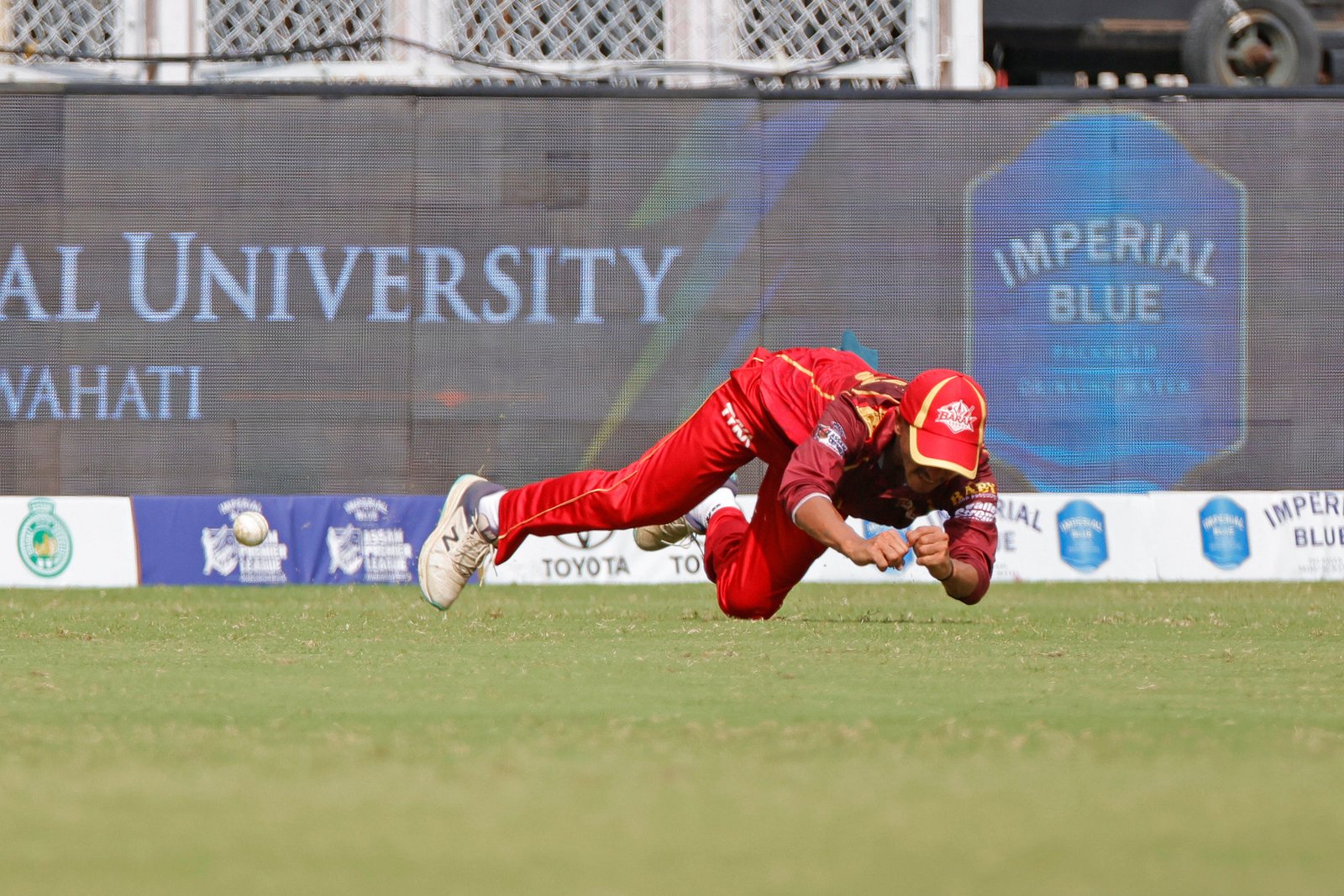 Rabi Chetry of team Barak Legends drops a catch during Match 7 of the APL T20 between Barak Legends and Guwahati Royals at ACA Stadium, Barsapara, Guwahati, India, on August 4, 2026.

Photo by R.Param / CREIMAS