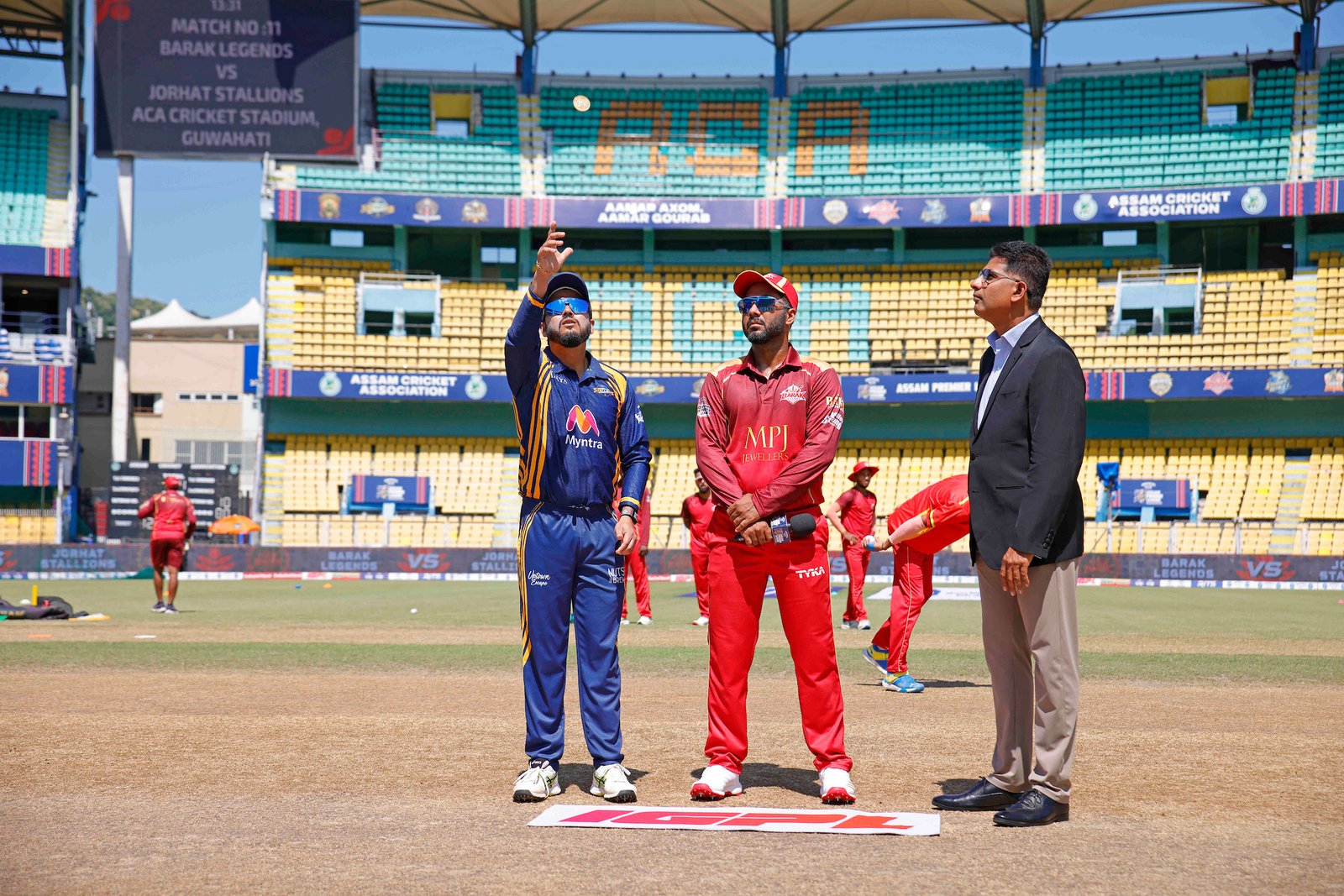 Swarupam Purkayastha (C) of team Jorhat Stallions and 
Sibsankar Roy (C) of team Barak Legends at toss during Match 11 of the APL T20 between Barak Legends and Jorhat Stallions at ACA Stadium, Barsapara, Guwahati, India, on August 6, 2026.

Photo by R.Param / CREIMAS