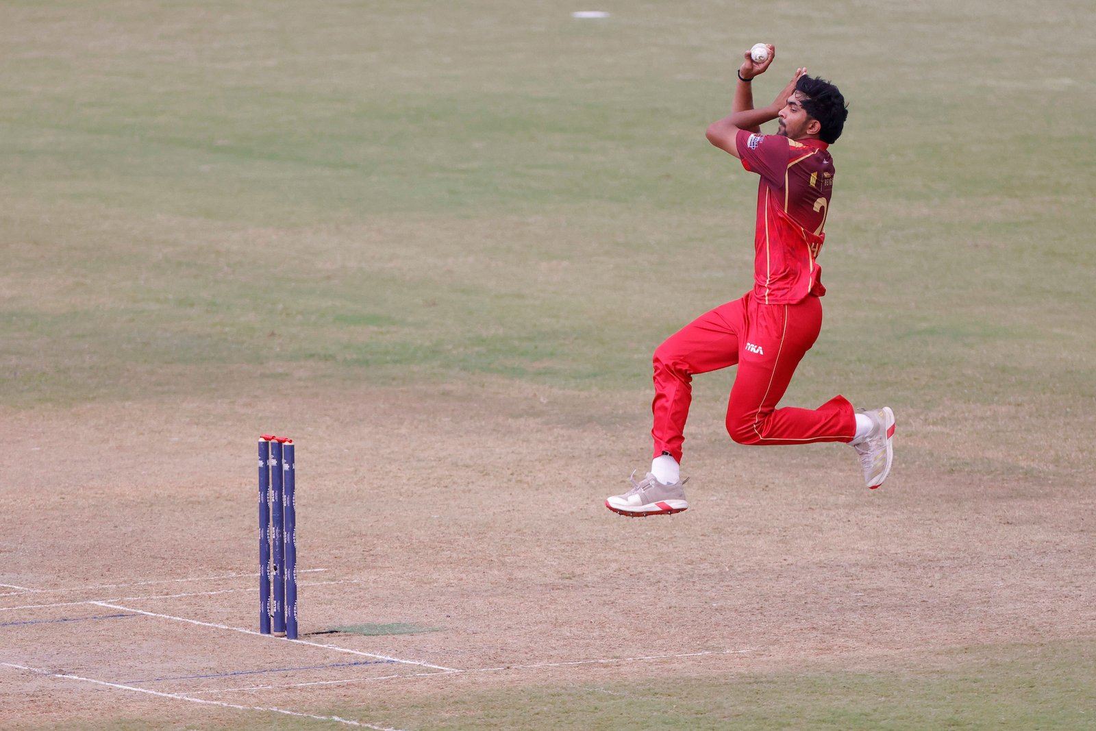 Harsh Kumar of team Barak Legends bowling during Match 11 of the APL T20 between Barak Legends and Jorhat Stallions at ACA Stadium, Barsapara, Guwahati, India, on August 6, 2026.

Photo by R.Param / CREIMAS