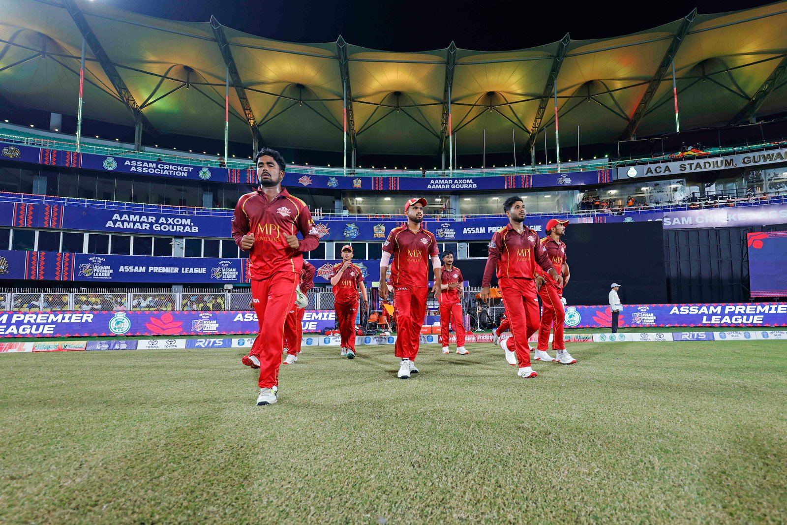 Team Barak Legends walking in during Match 24 of the APL T20 between Tezpur Titans and Barak Legends at ACA Stadium, Barsapara, Guwahati, India, on August 12, 2026.

Photo by R.Param / CREIMAS
