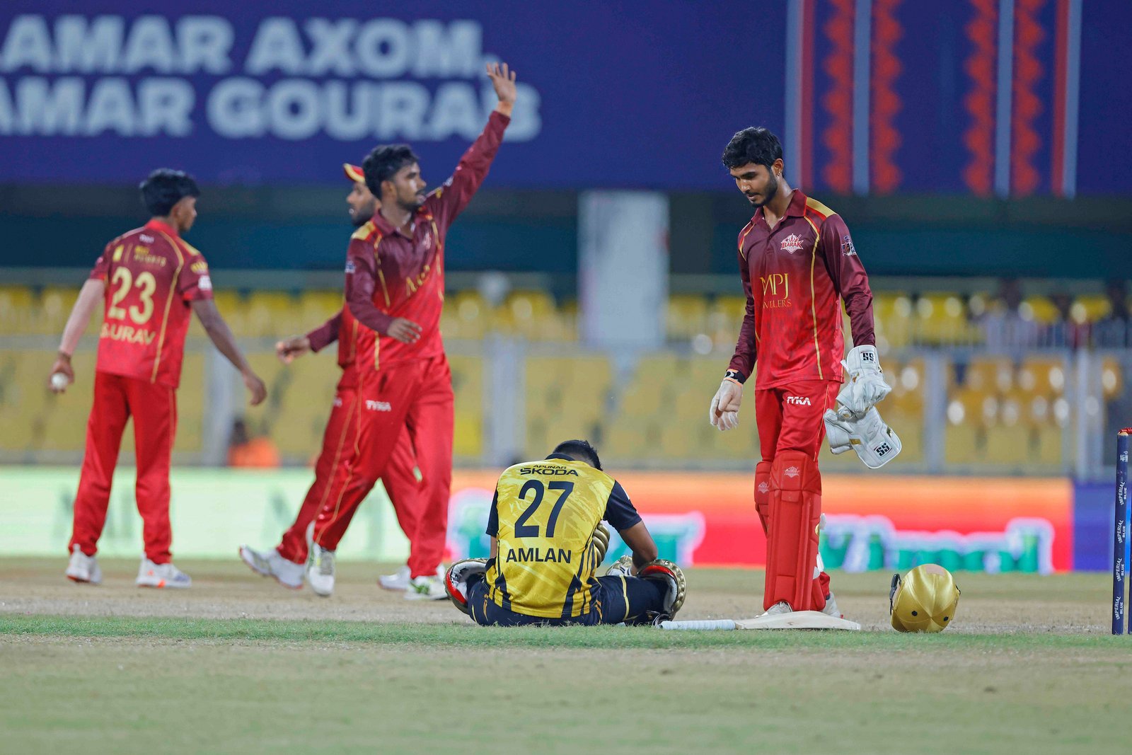 Amlanjyoti Das of team Charaideo Sunrisers gets hit by the ball during Match 14 of the APL T20 between Charaideo Sunrisers and Barak Legends at ACA Stadium, Barsapara, Guwahati, India, on August 7, 2026.

Photo by R.Param / CREIMAS
